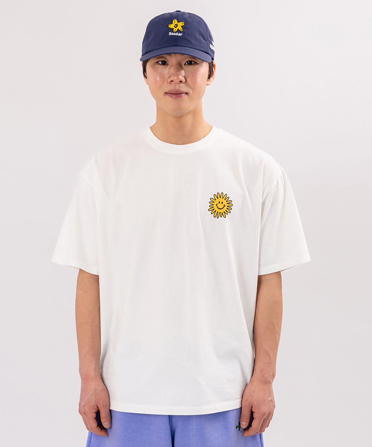 빅웨이브 컬렉티브(BIGWAVE COLLECTIVE) 피스어게인 반팔 티셔츠 (오프 화이트)