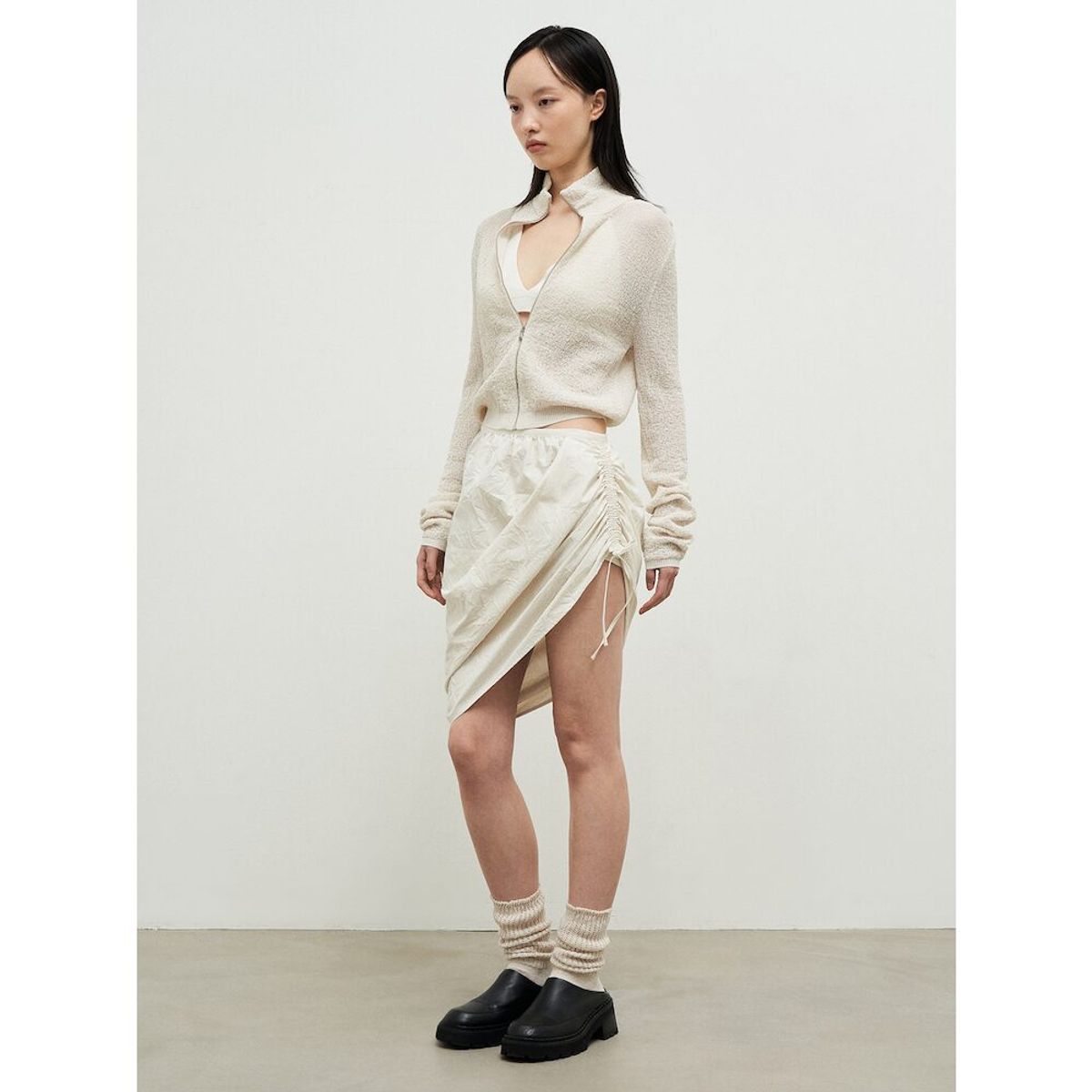 앙개(ANGGAE) Wonderer Wrinkle String Mini Skirt  Ivory