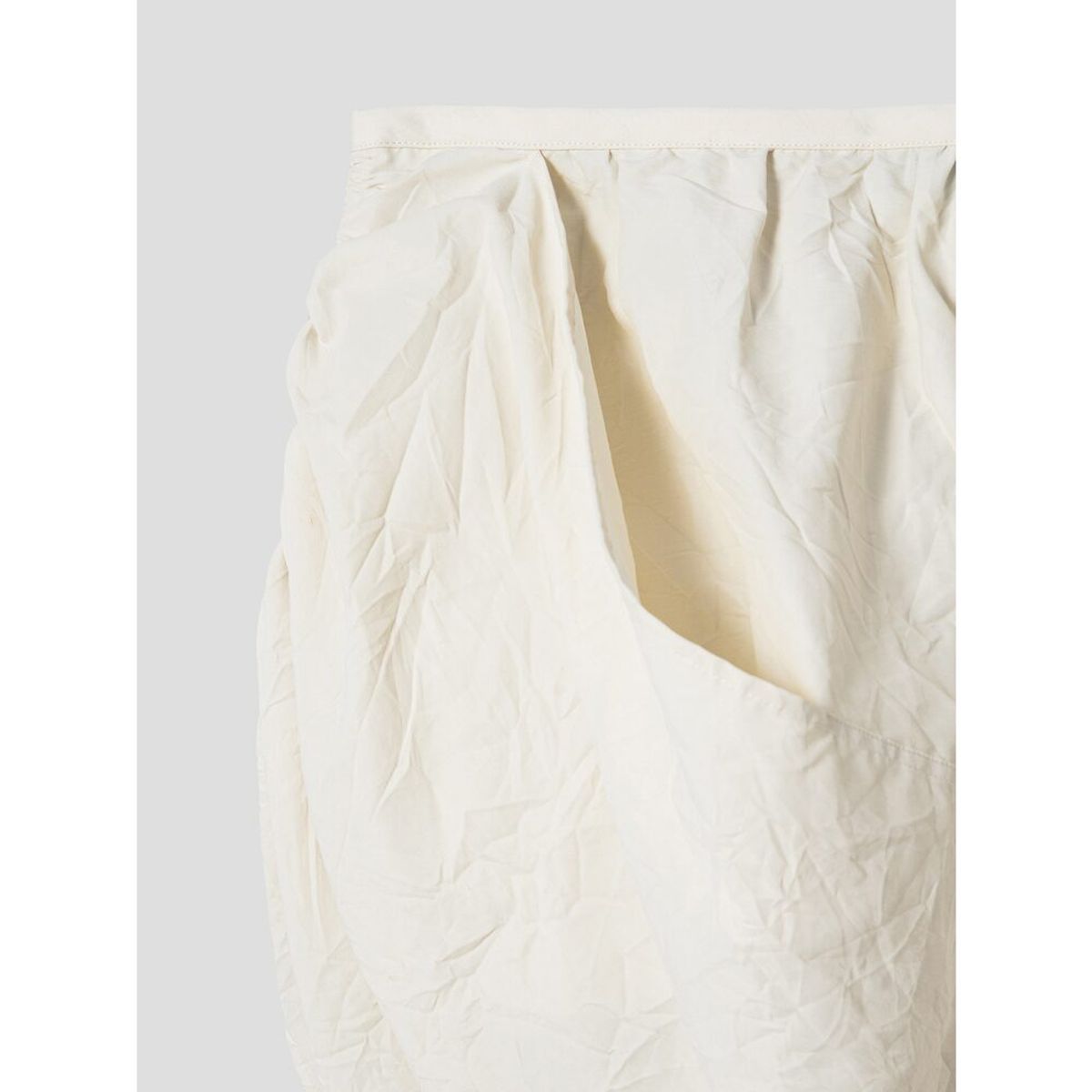 앙개(ANGGAE) Wonderer Wrinkle String Mini Skirt  Ivory