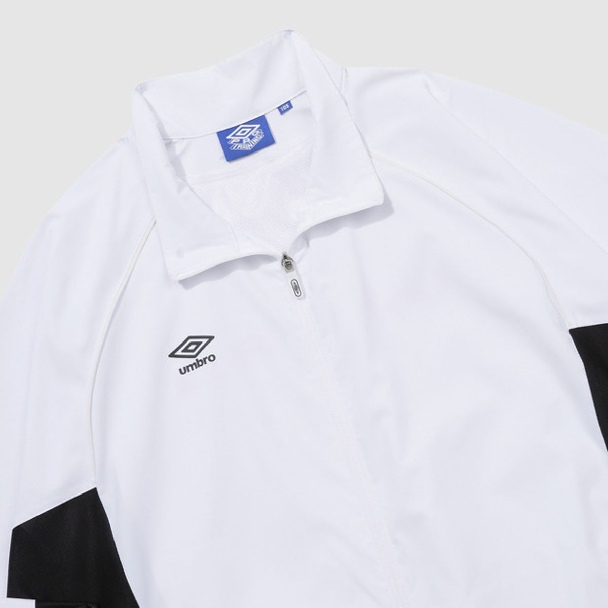 엄브로(UMBRO) PTR 워밍업 스탠넥 바람막이 자켓 화이트(UQ121SJK21)