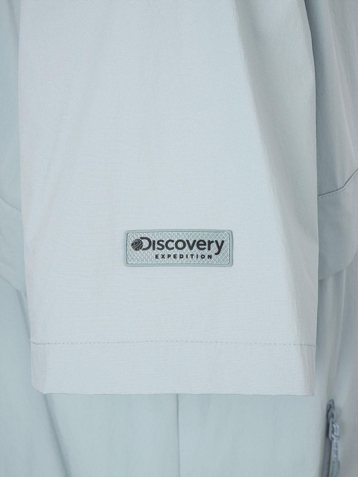 디스커버리 익스페디션(DISCOVERY EXPEDITION) 프레시벤트 폴튼 트레이닝 반팔 아노락 (L. SKY BLUE)