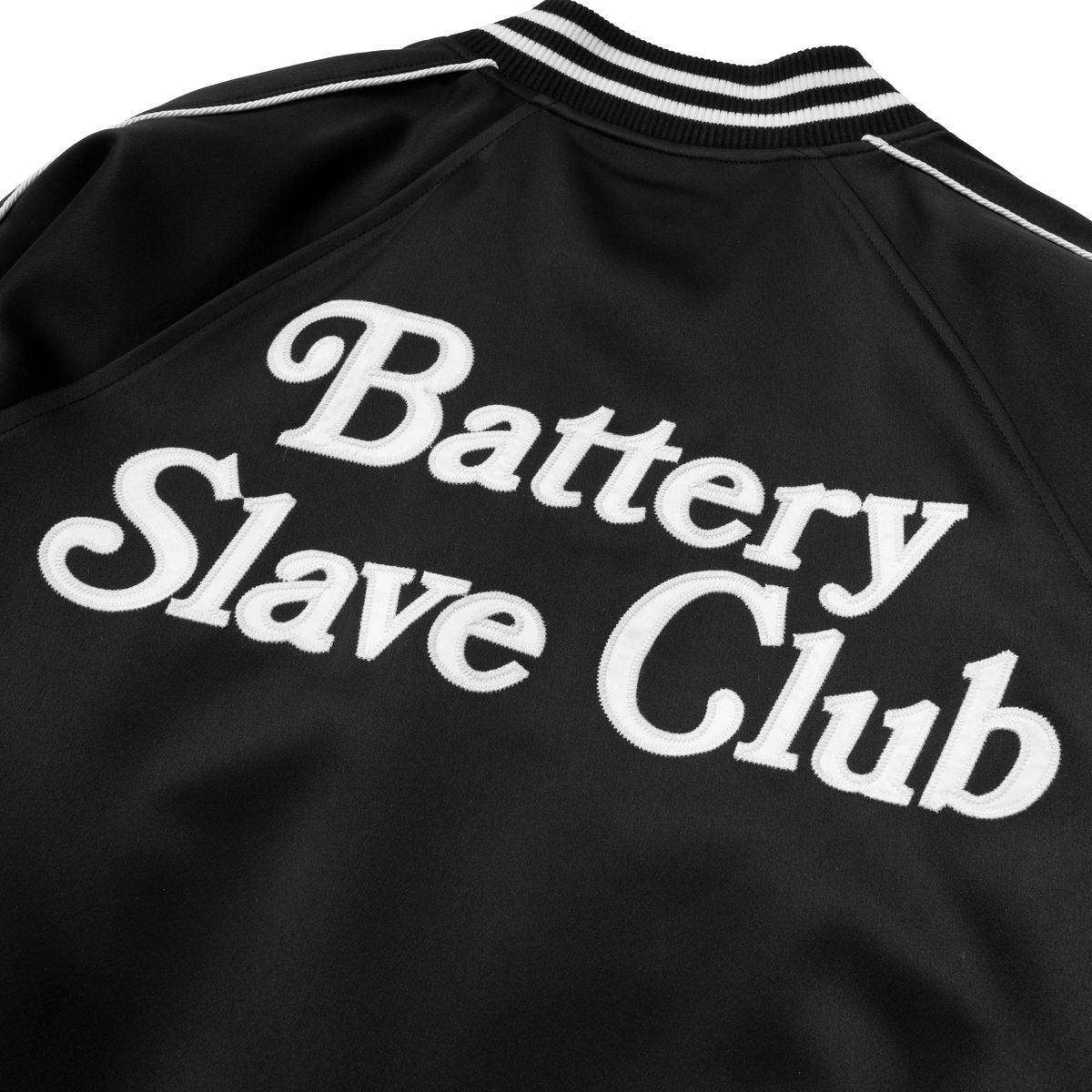 엑스트라오디너리(EXTRAORDINARY) B.S.C SOUVENIR SATIN JACKET BLACK