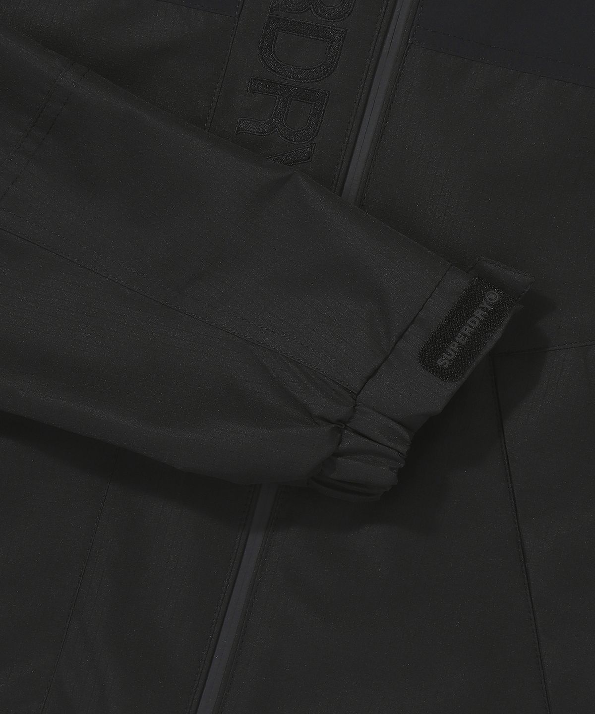 슈퍼드라이(SUPERDRY) W 시그니처 윈드치터 자켓 블랙