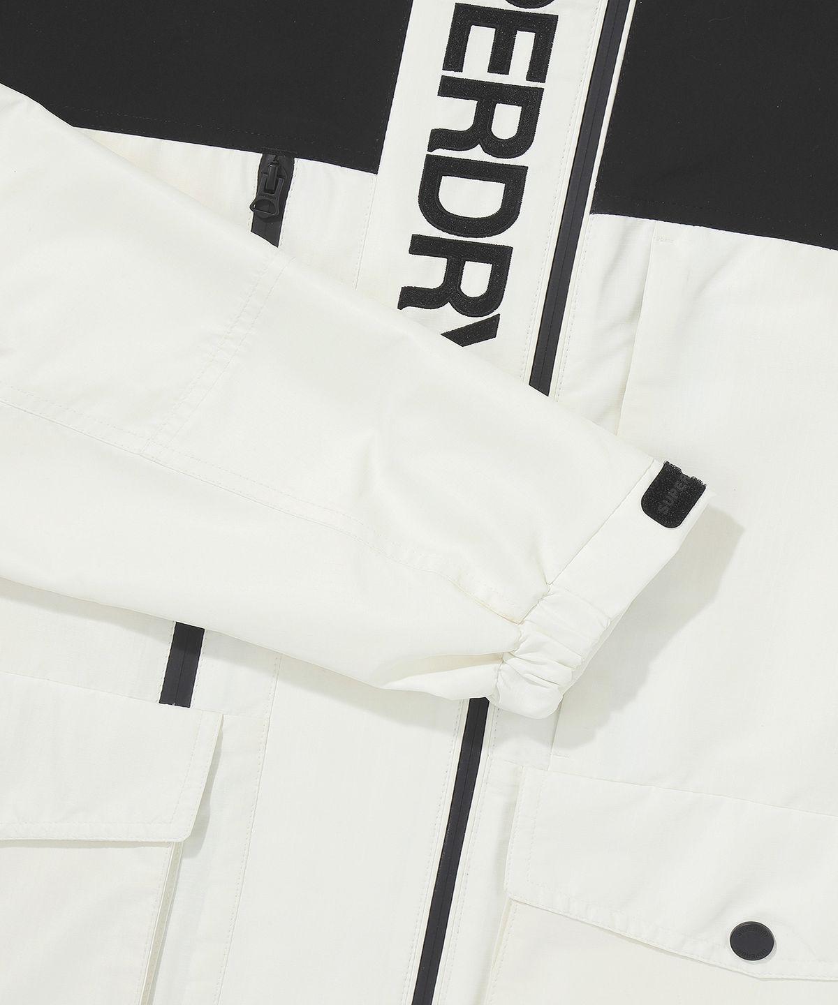 슈퍼드라이(SUPERDRY) 시그니처 윈드치터 자켓 크림