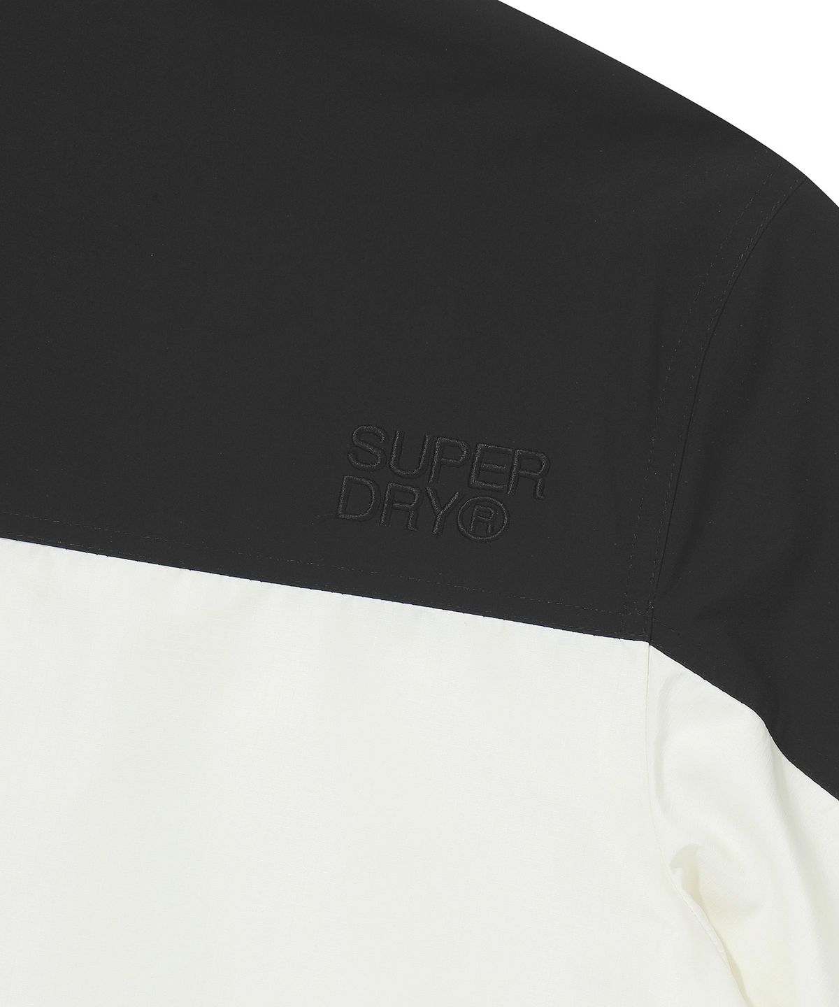 슈퍼드라이(SUPERDRY) 시그니처 윈드치터 자켓 크림