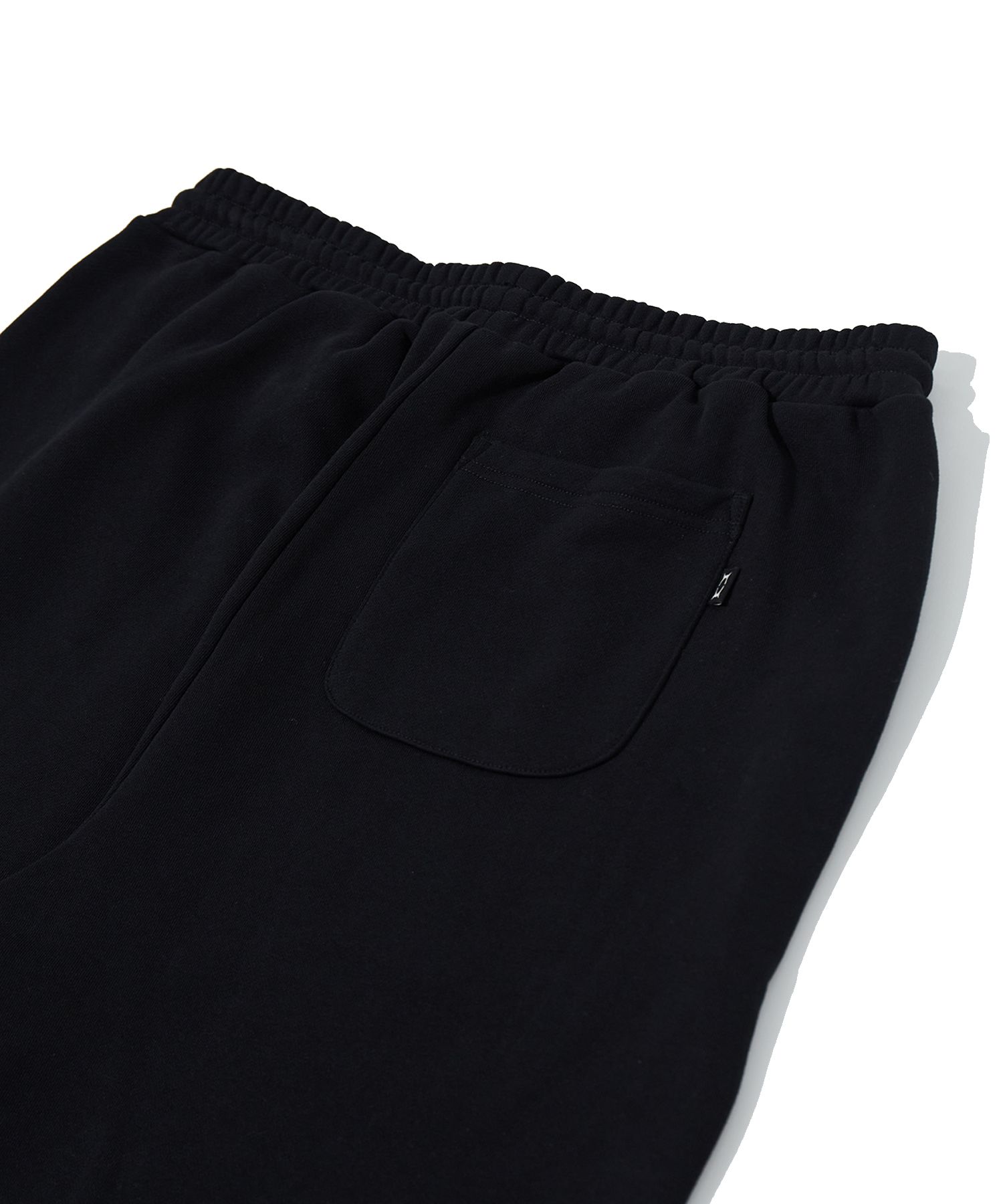 MUSINSA | CRITIC OG WORMHOLE LOGO PANTS BLACK