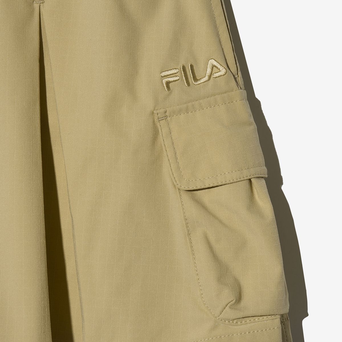 휠라 키즈(FILA KIDS) 우븐 카고 치마바지