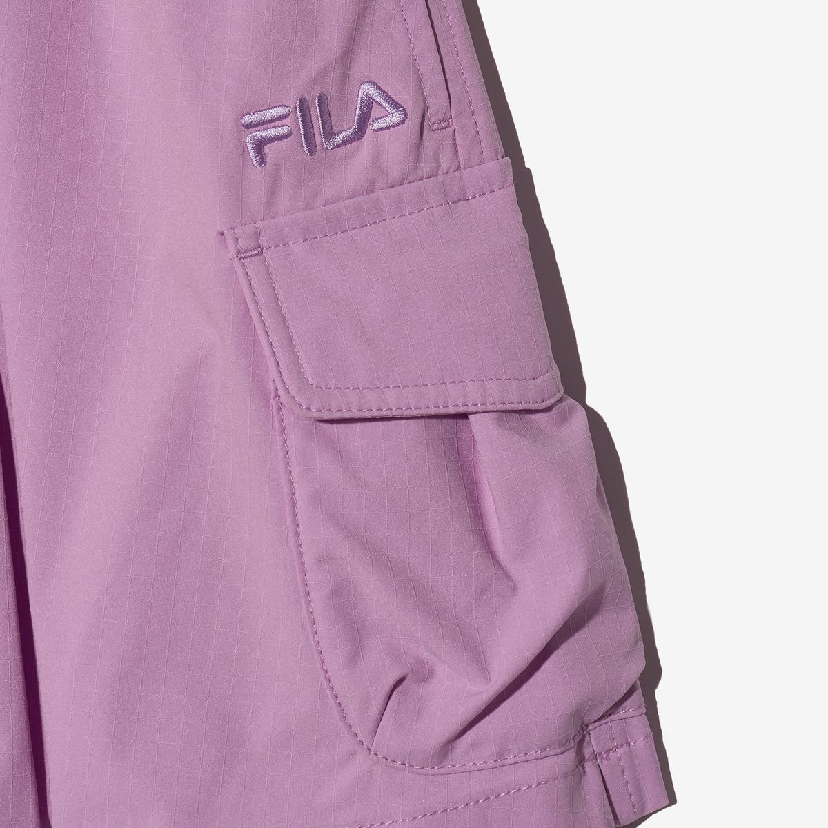 휠라 키즈(FILA KIDS) 우븐 카고 치마바지