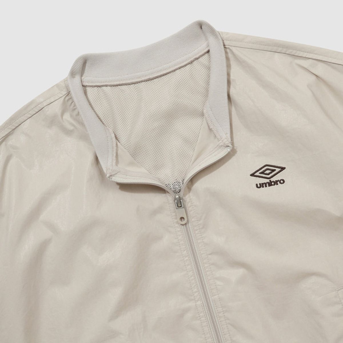엄브로(UMBRO) 우먼스 코팅 봄버 자켓 베이지(UQ122CJK26)