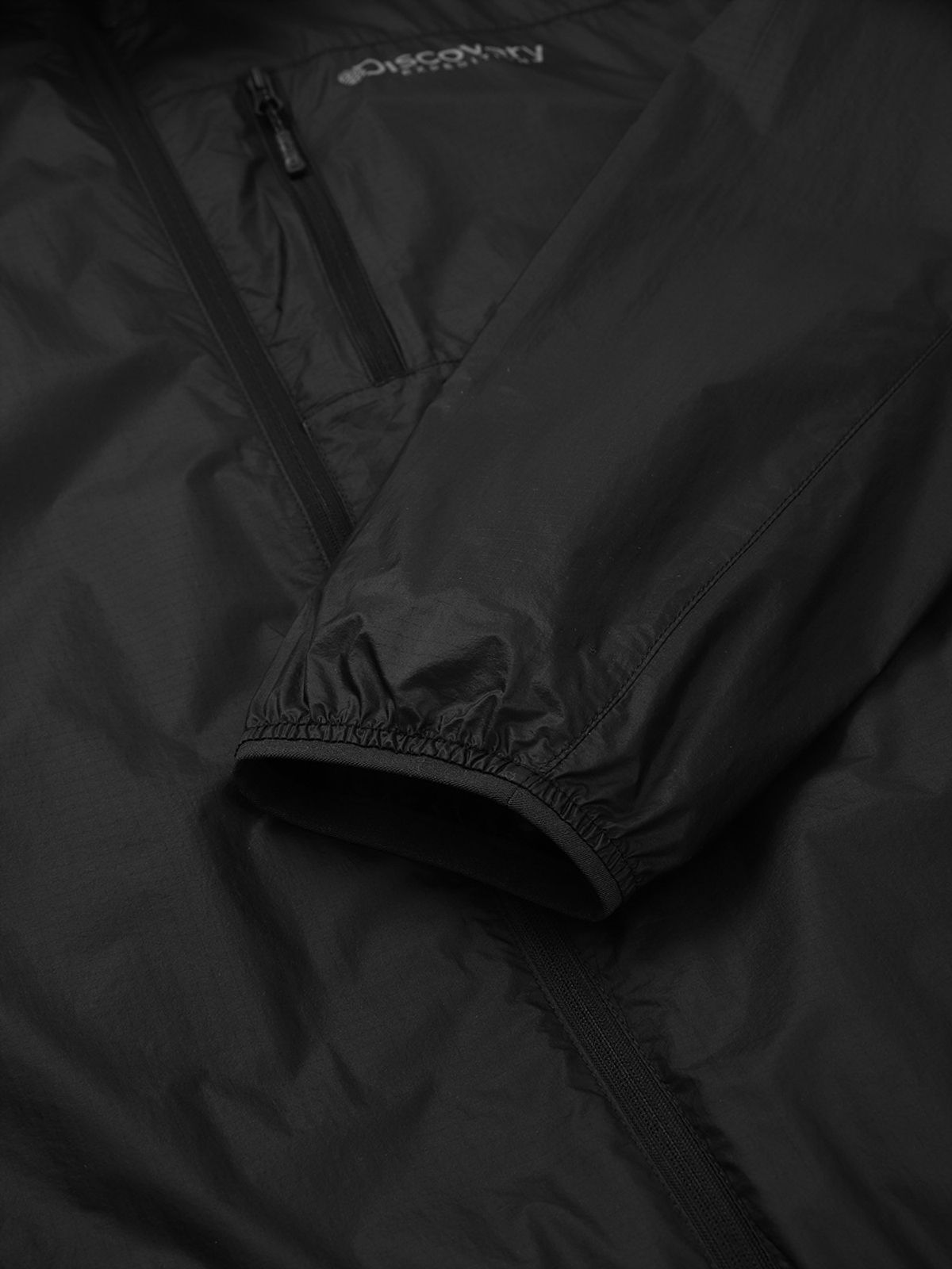 디스커버리 익스페디션(DISCOVERY EXPEDITION) 남성 초경량 립스탑 하이넥 바람막이 (BLACK)