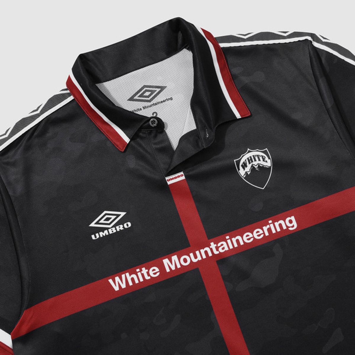 엄브로(UMBRO) [UMB X White Mountaineering] 유니폼 반팔 티셔츠 블랙(UQ111CRJ29)