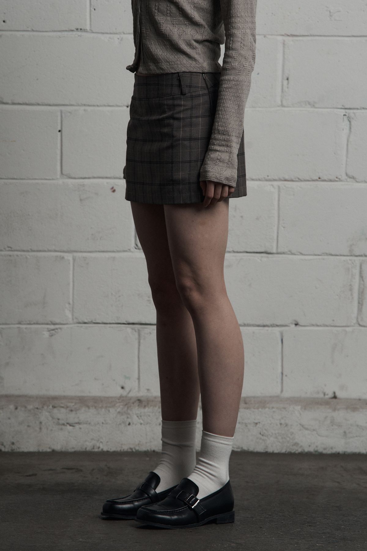 시너진(SYNERJYN) CLASSIC CHECK MINI SKIRT DARK BEIGE