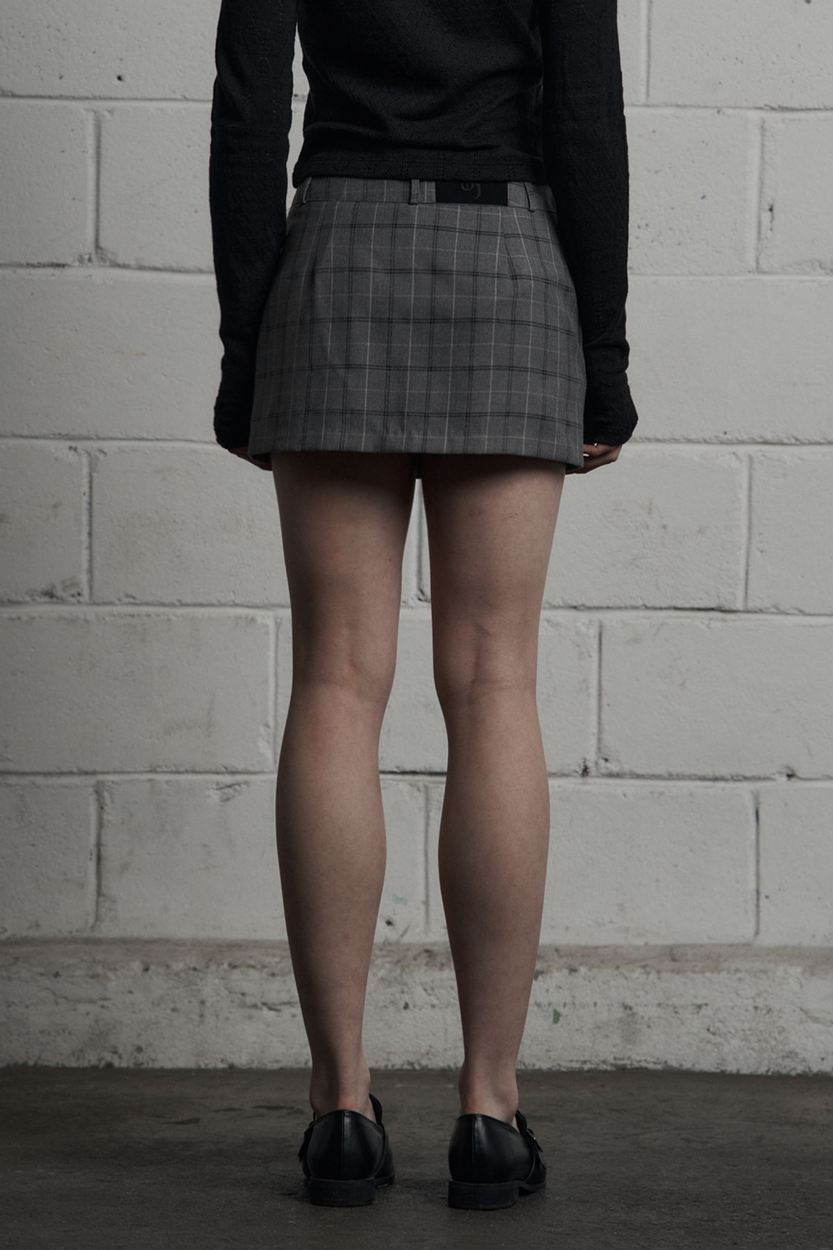 시너진(SYNERJYN) CLASSIC CHECK MINI SKIRT GRAY