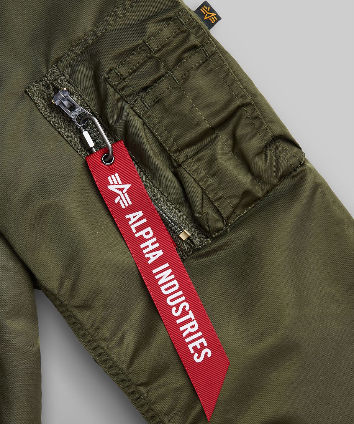 알파 인더스트리(ALPHA INDUSTRIES) L-2B 후디드 GEN II 플라이트 자켓 OG-107 그린