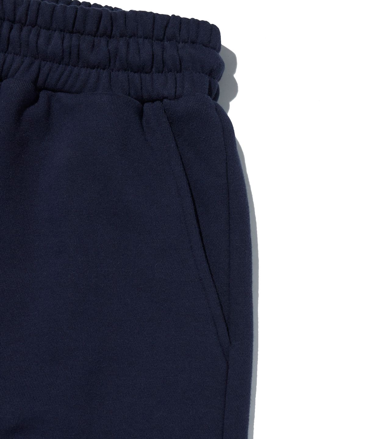 스웨이드(SUADE) WIDE SWEAT SHORTS [NAVY]