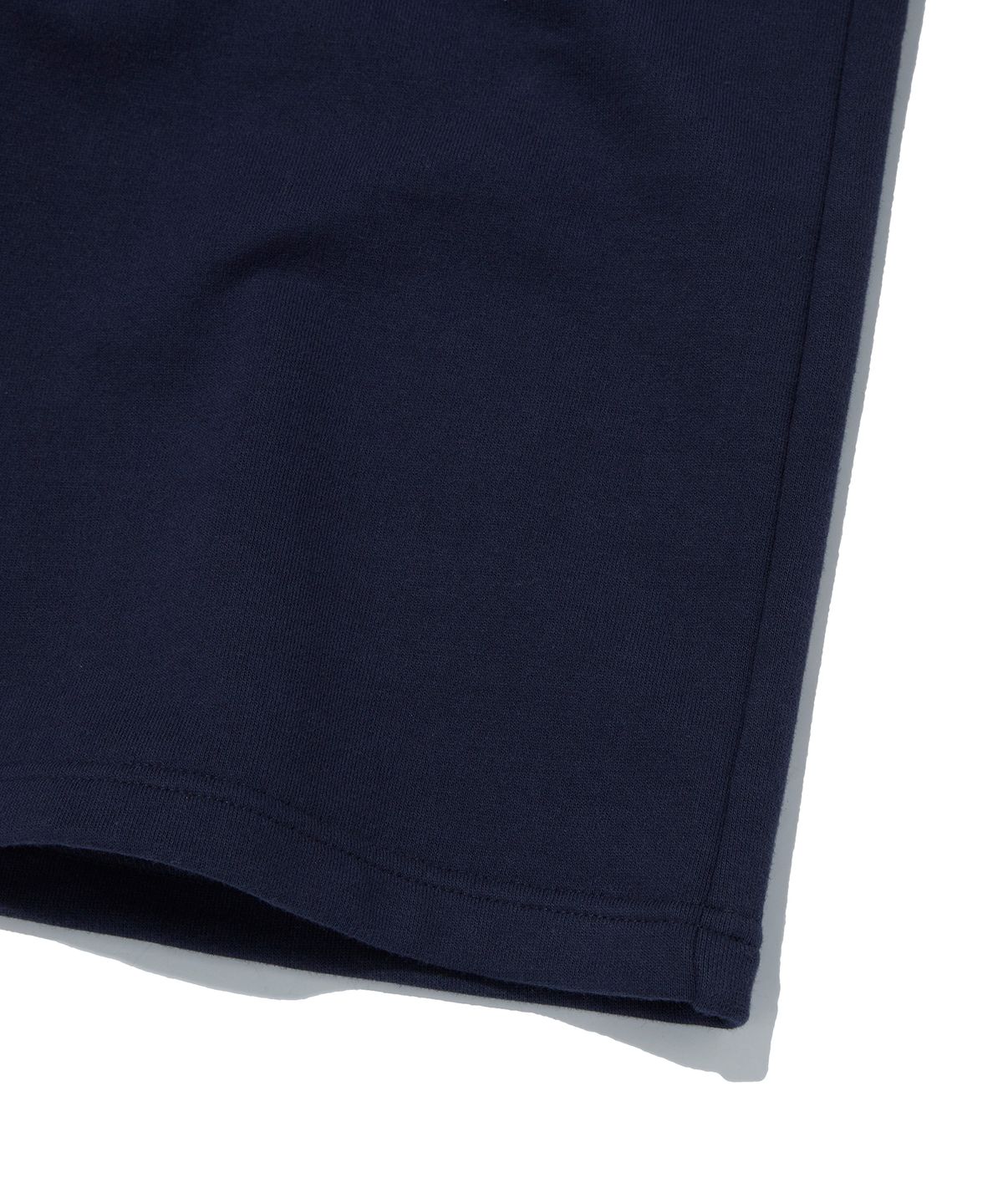 스웨이드(SUADE) WIDE SWEAT SHORTS [NAVY]