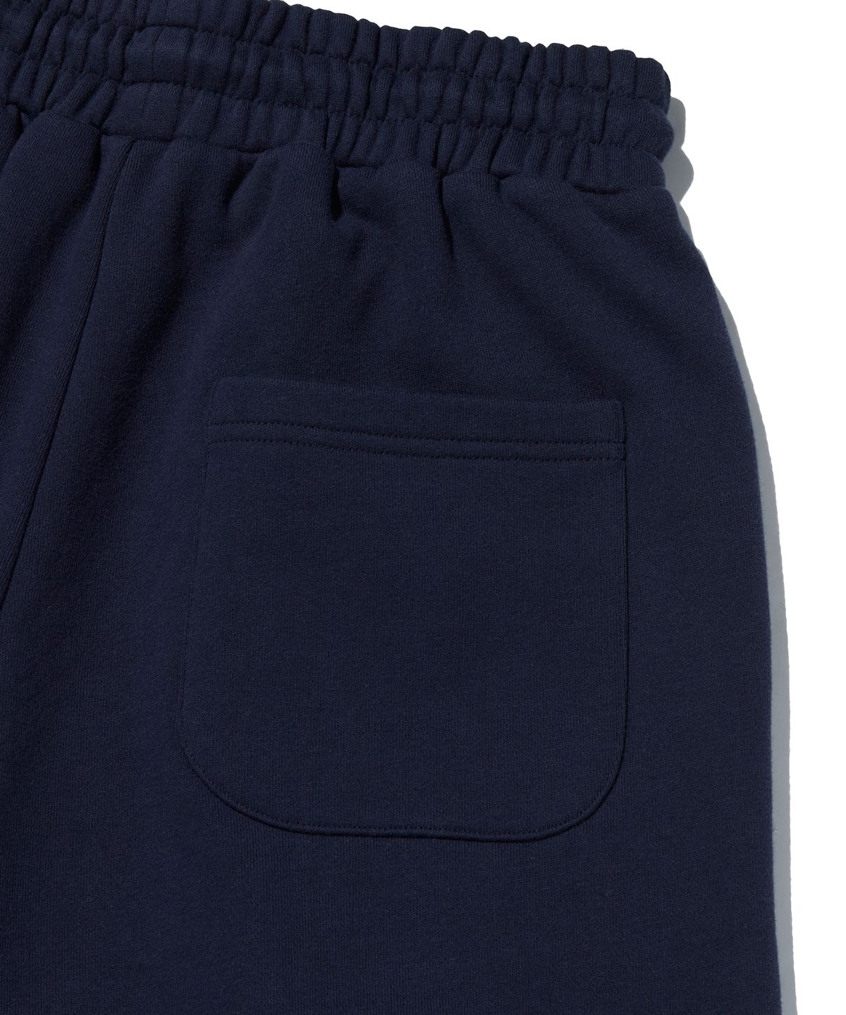 스웨이드(SUADE) WIDE SWEAT SHORTS [NAVY]