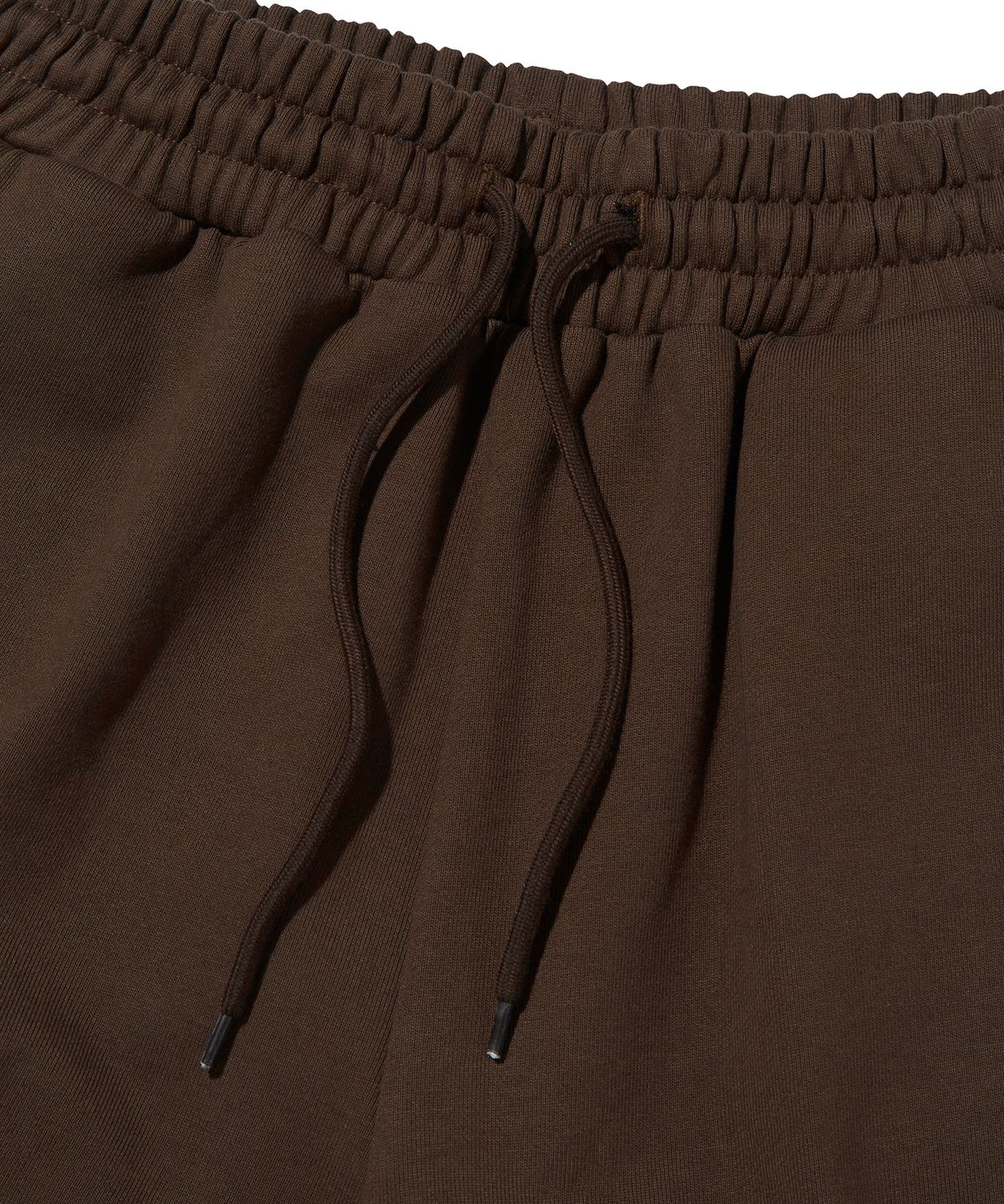 스웨이드(SUADE) WIDE SWEAT SHORTS [BROWN]