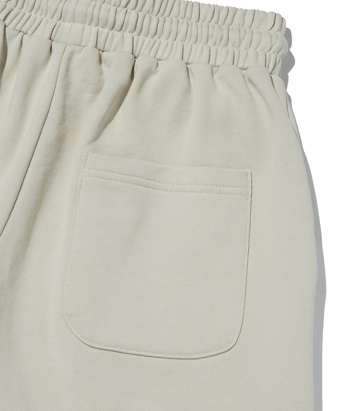 스웨이드(SUADE) WIDE SWEAT SHORTS [IVORY]