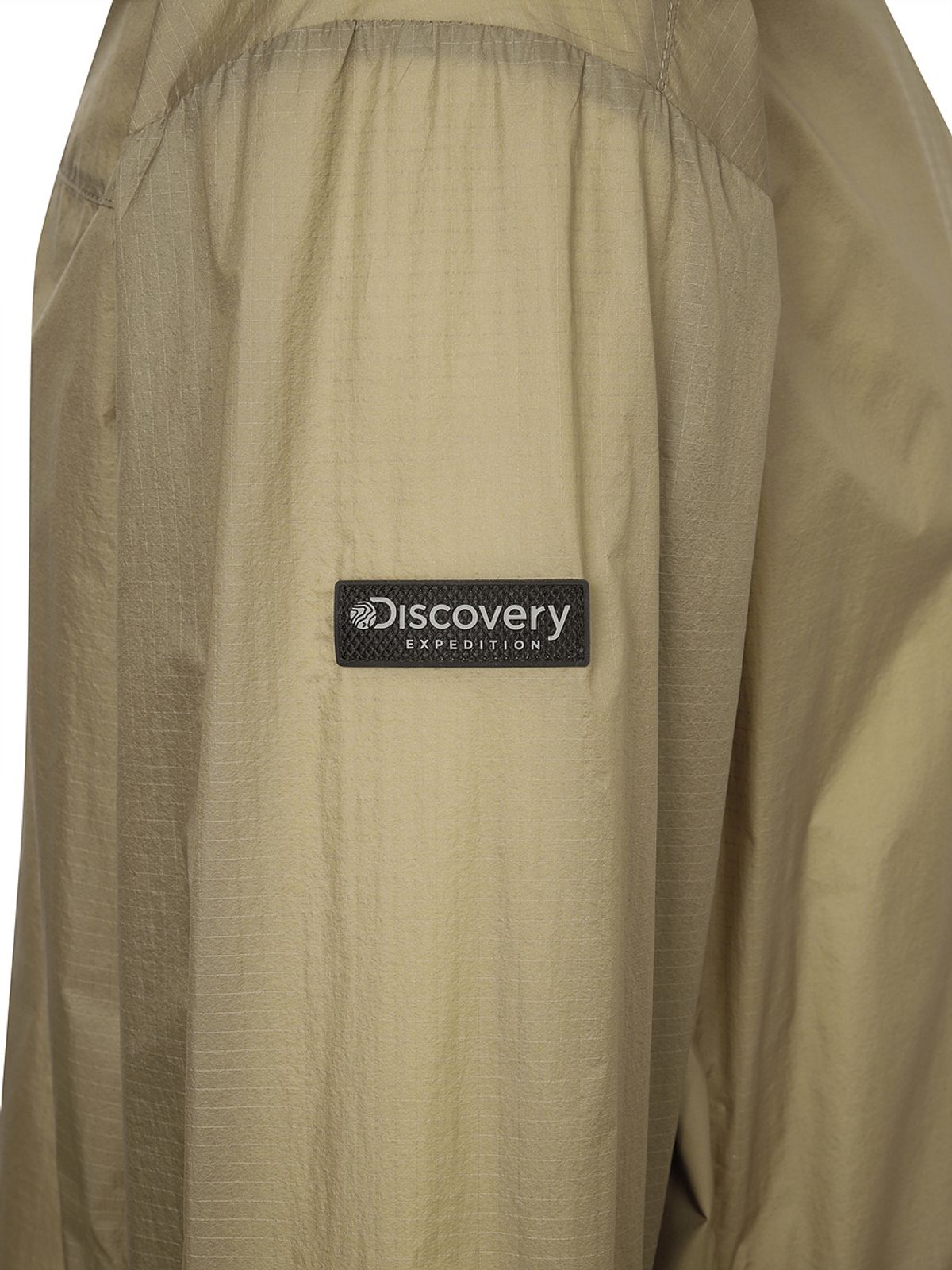 디스커버리 익스페디션(DISCOVERY EXPEDITION) 남성 초경량 립스탑 하이넥 바람막이 (D/CAMEL)