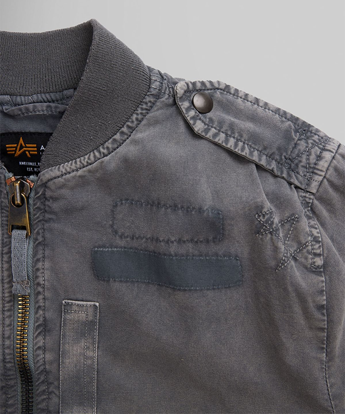 알파 인더스트리(ALPHA INDUSTRIES) L-2B 립 앤 리페어 플라이트 자켓 여성 에어크래프트 그레이