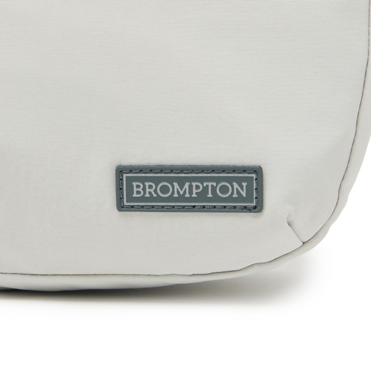 브롬톤 런던(BROMPTON LONDON) REPLECTIVE STRING CROSS BAG - L/GREY (P255ACR101)