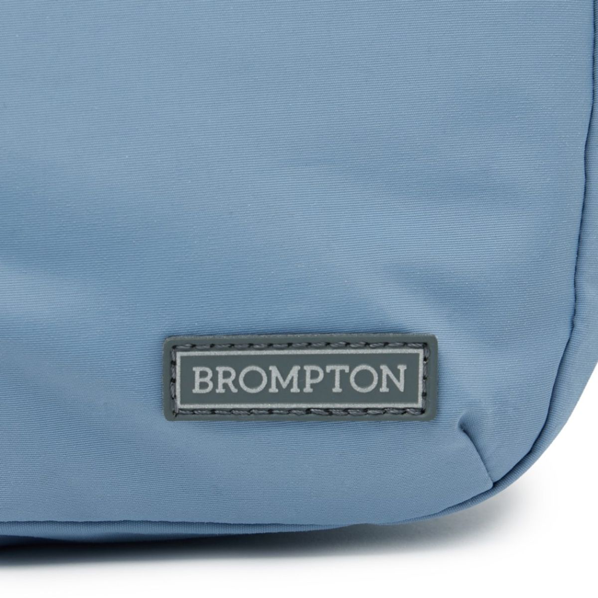 브롬톤 런던(BROMPTON LONDON) REPLECTIVE STRING CROSS BAG - BLUE GREY (P255ACR101)