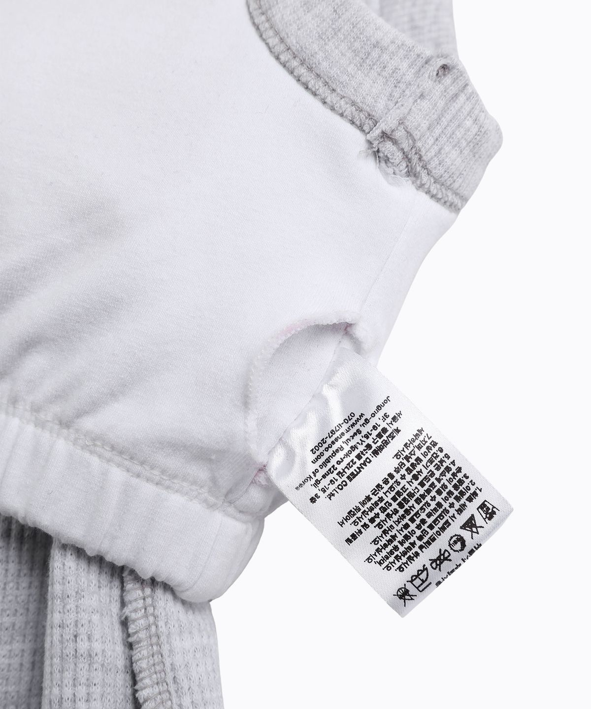 미나수(MENASOO) Track Logo Reversible Waffle Sleeveless_White Melange