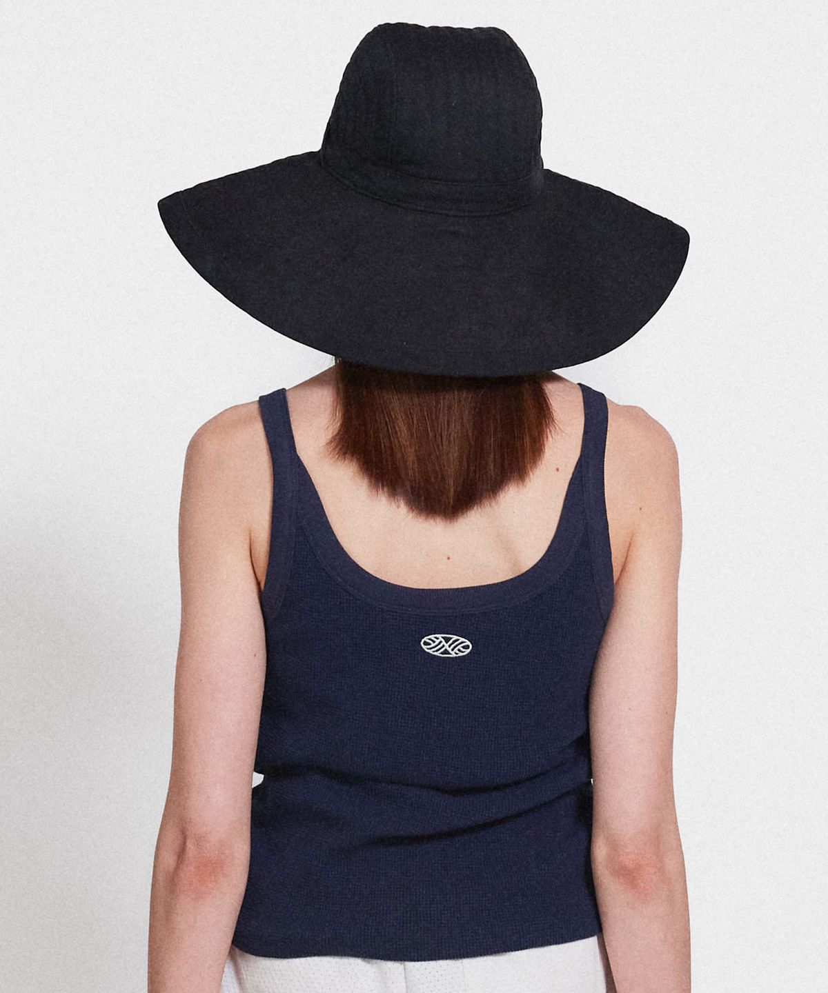 미나수(MENASOO) Track Logo Reversible Waffle Sleeveless_Navy