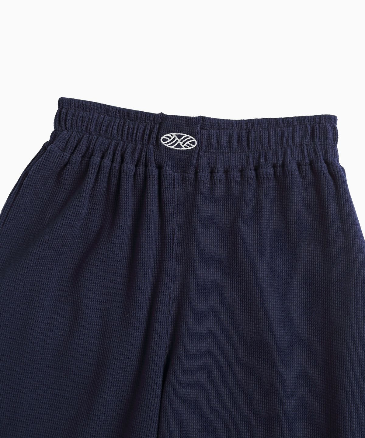 미나수(MENASOO) Track Logo Waffle Jogger Pants_Navy