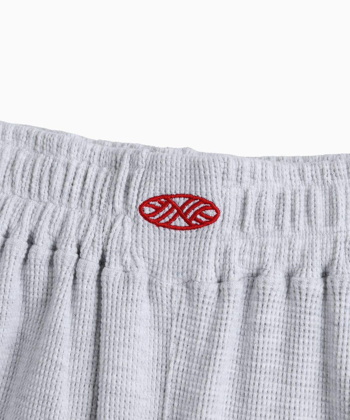 미나수(MENASOO) Track Logo Waffle Jogger Pants_White Melange