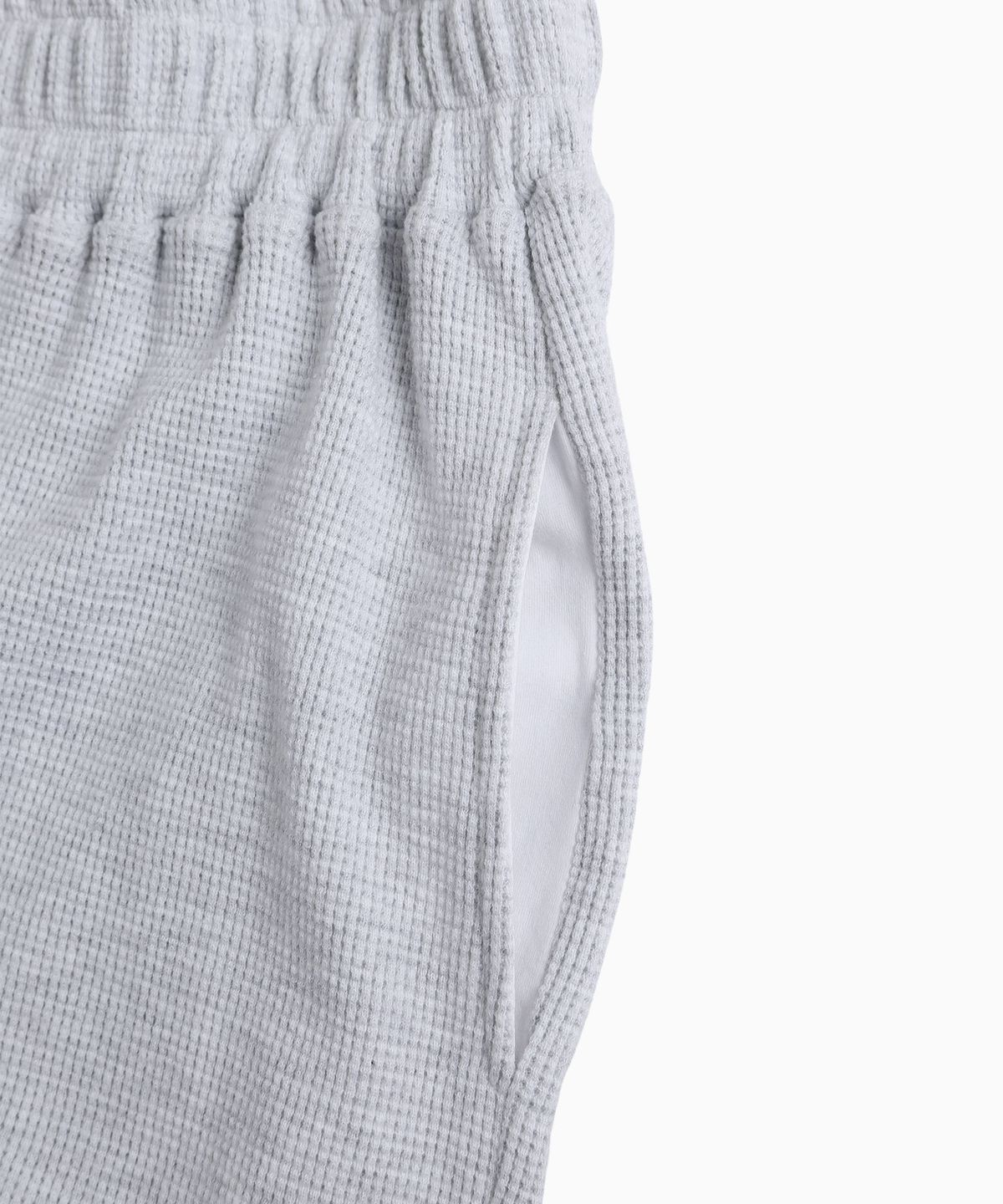미나수(MENASOO) Track Logo Waffle Jogger Pants_White Melange