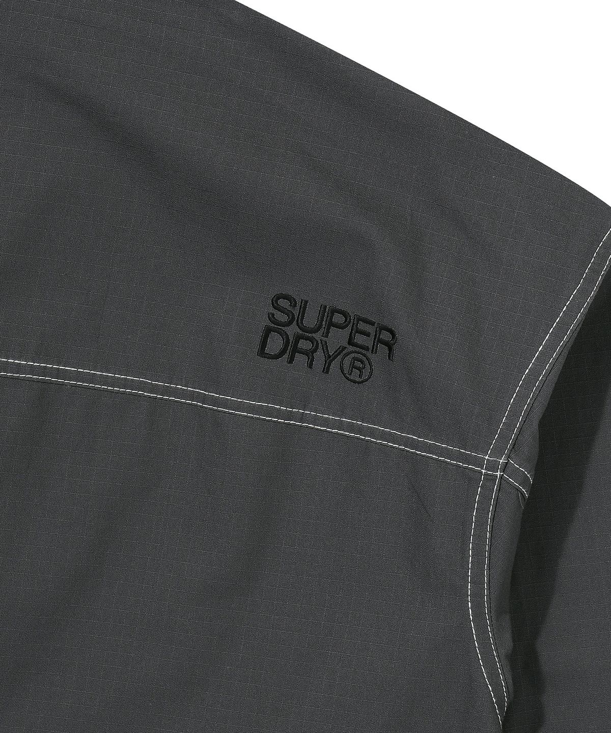 슈퍼드라이(SUPERDRY) 에센셜 윈드브레이커 자켓 베이지 챠콜