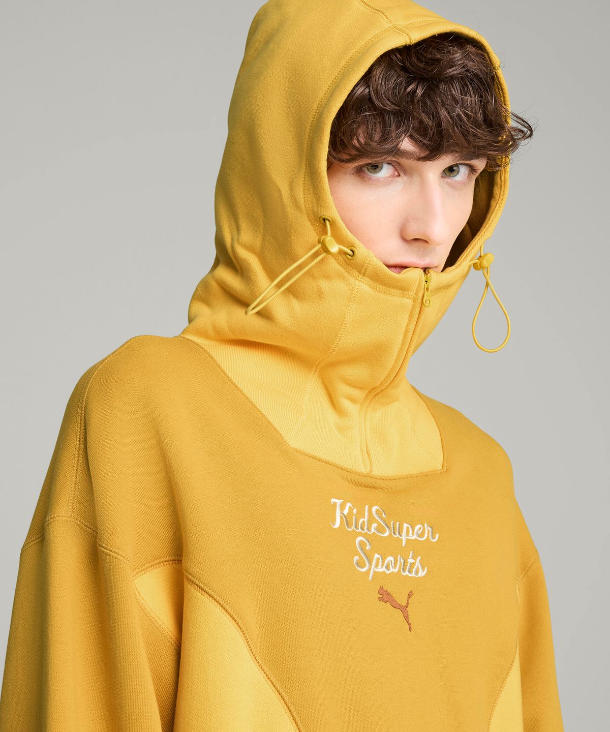 푸마(PUMA) 푸마 x 키드슈퍼 프로그레시브 후디 - 골드 / 630932-62