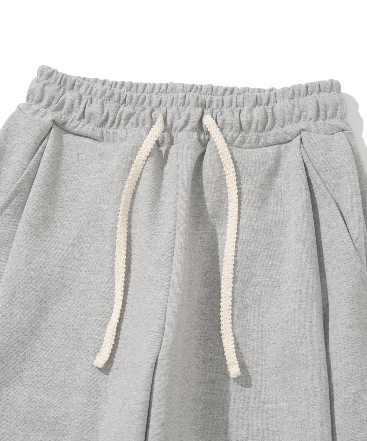 니티드(KNITTED) 커브드 트레이닝 팬츠 MELANGE GREY
