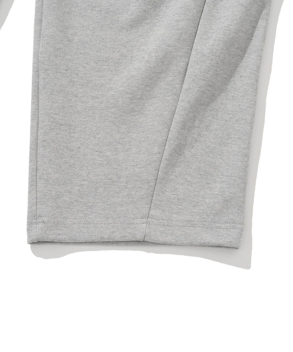 니티드(KNITTED) 커브드 트레이닝 팬츠 MELANGE GREY