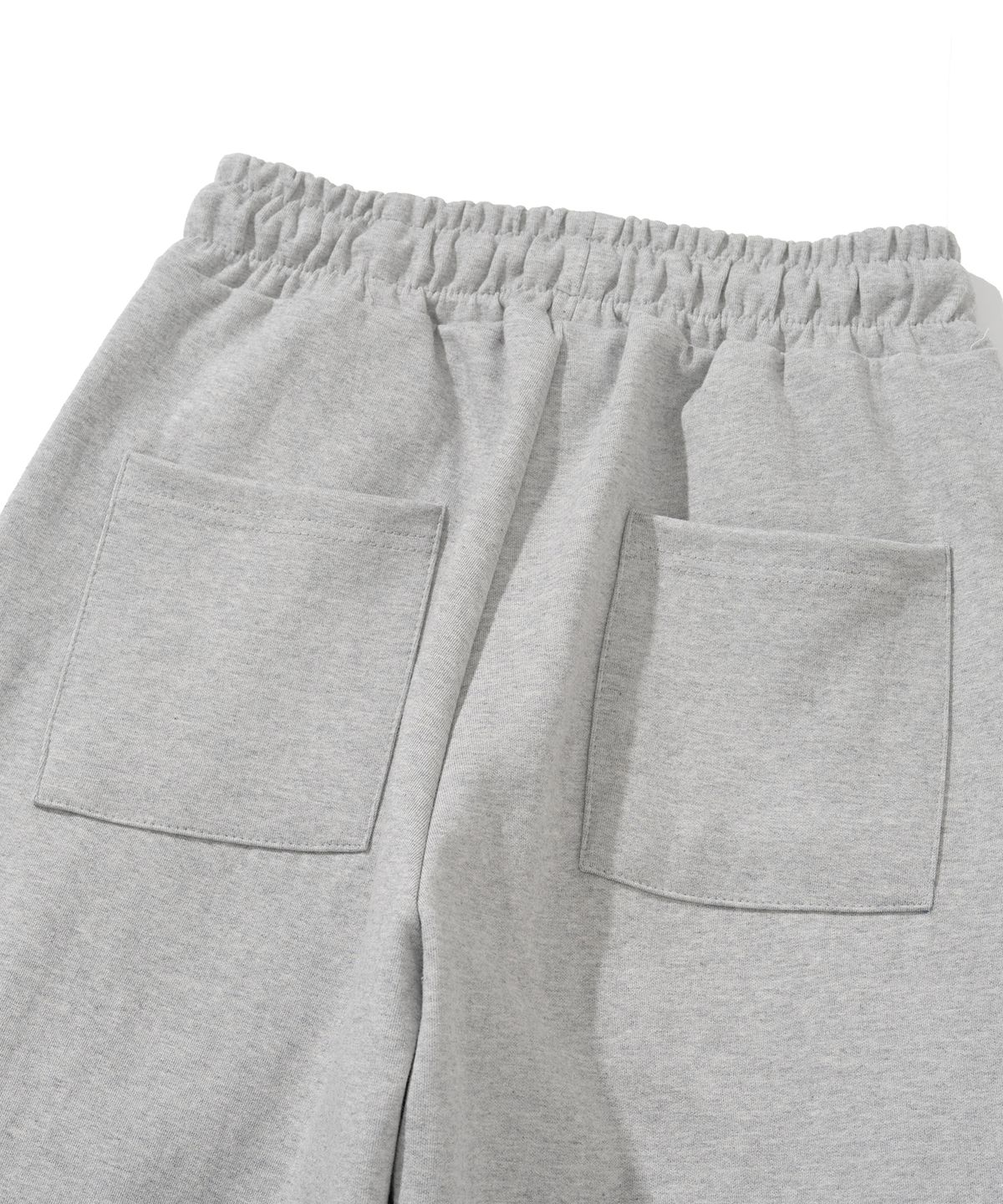 니티드(KNITTED) 커브드 트레이닝 팬츠 MELANGE GREY