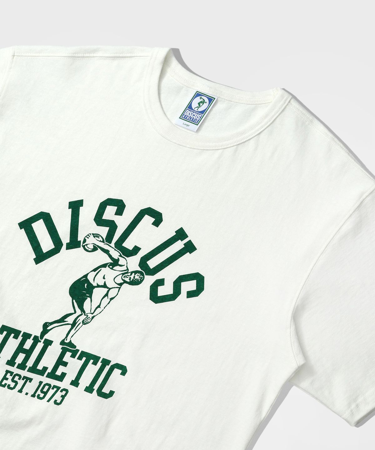 디스커스 애슬레틱(DISCUS ATHLETIC) 헤비웨이트 센터 로고 티셔츠 오프 화이트