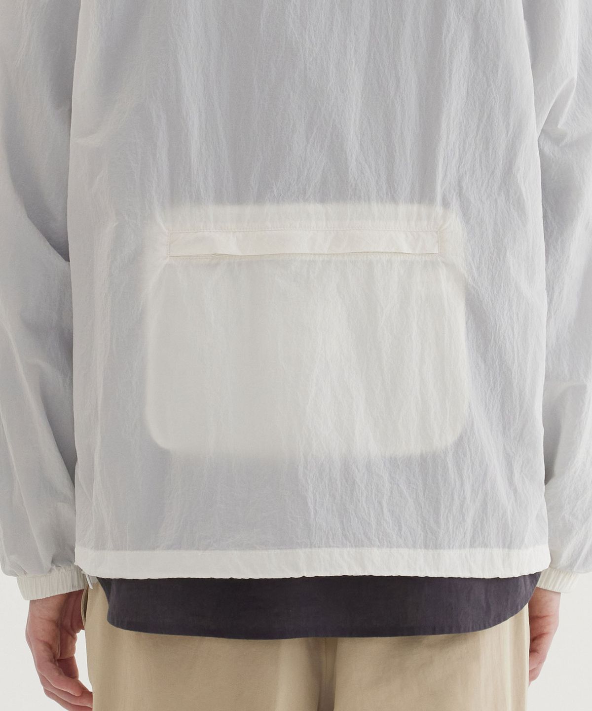 커버낫(COVERNAT) 패커블 경량 윈드브레이커 자켓 White