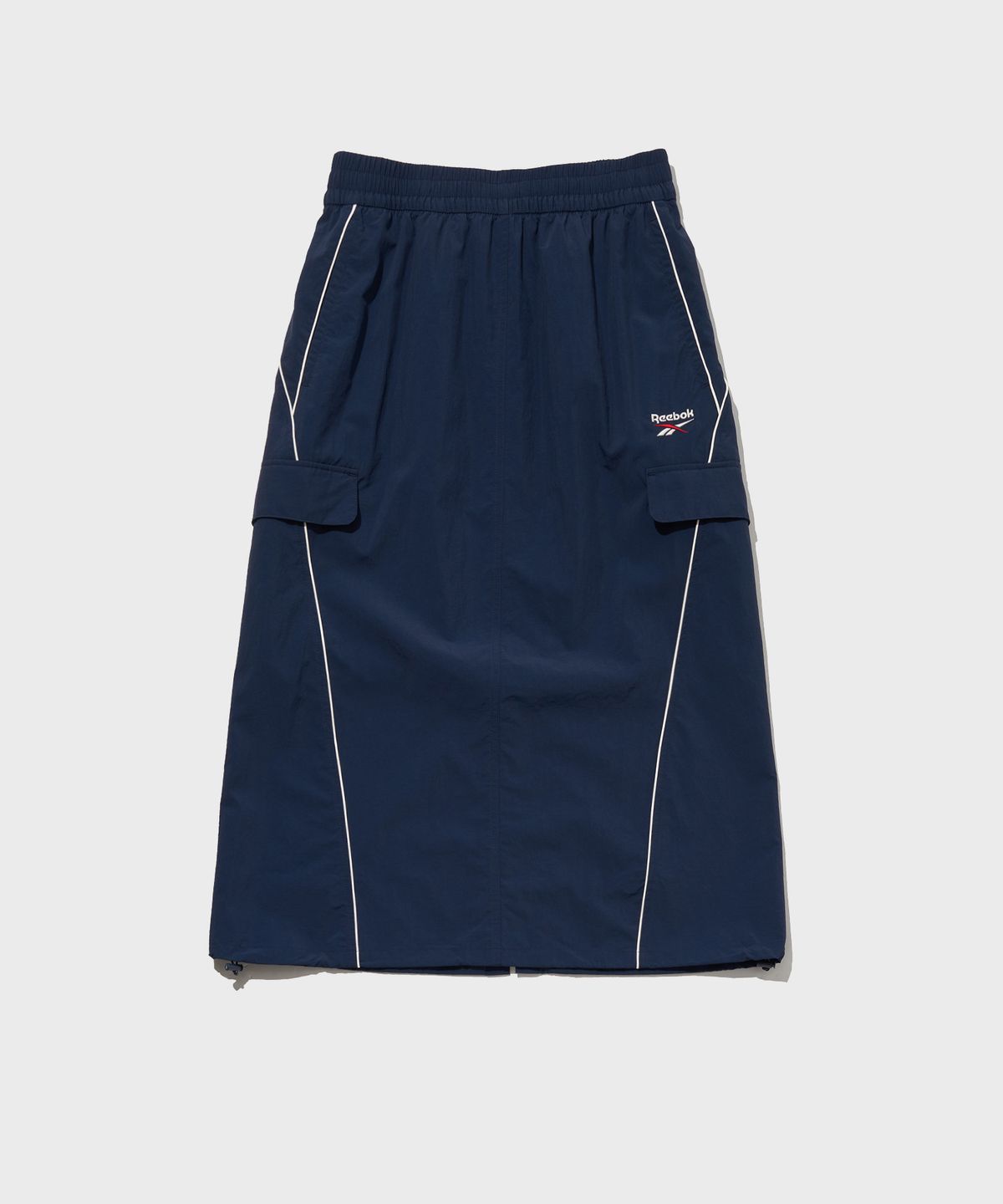 리복(REEBOK) 파이핑 우븐 스커트 (W) - 네이비