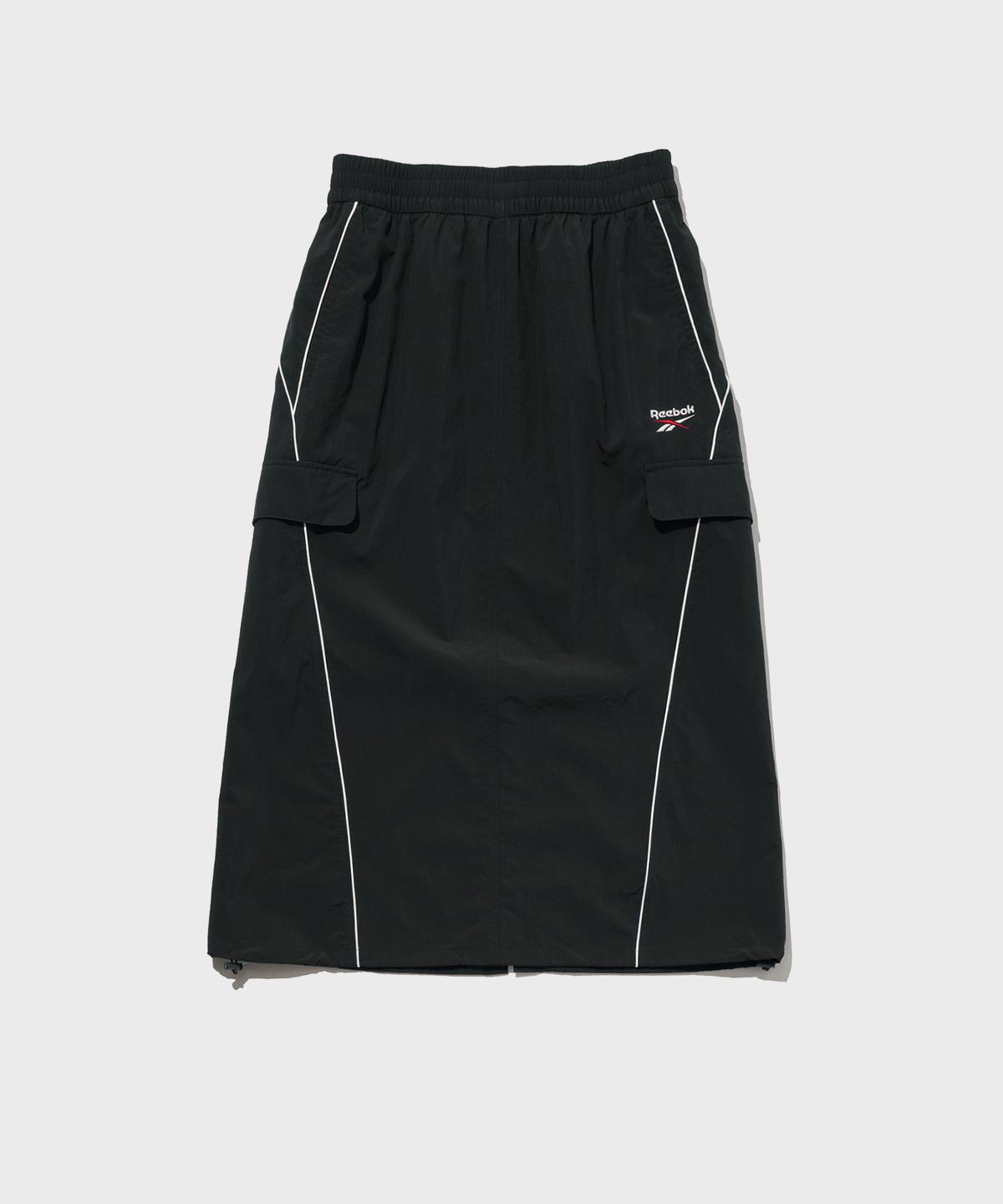 리복(REEBOK) 파이핑 우븐 스커트 (W) - 블랙
