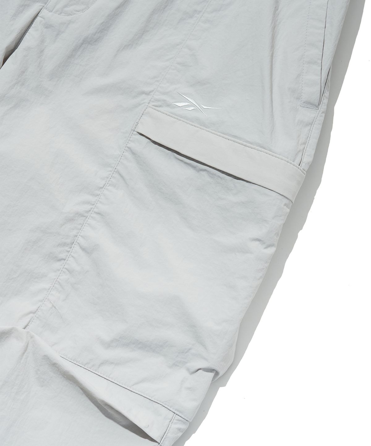 리복(REEBOK) 우븐 카고 팬츠 - 라이트 그레이