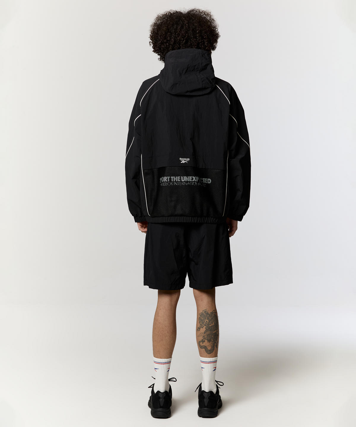 리복(REEBOK) 리드벡터 윈드 브레이커 - 블랙