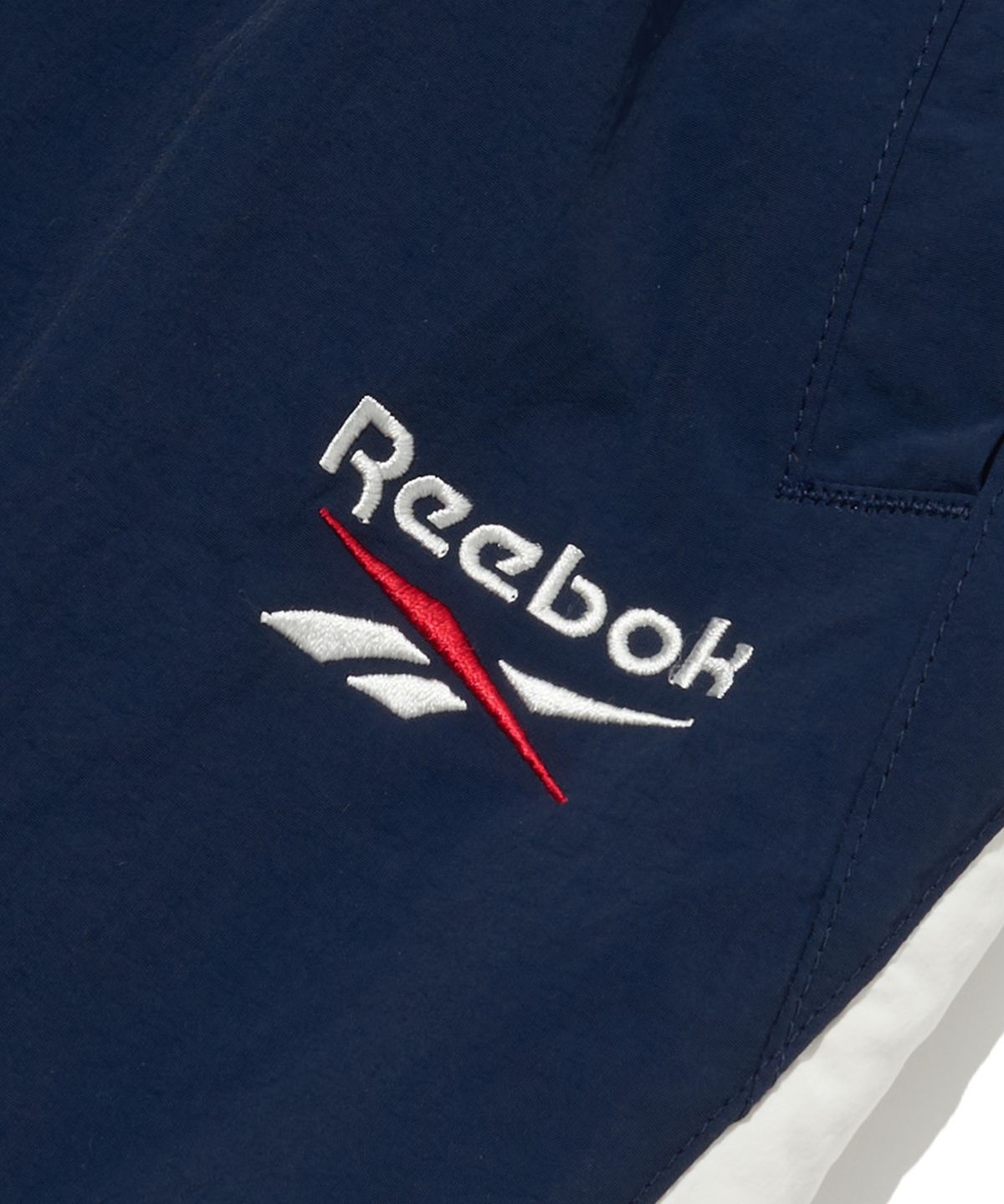 리복(REEBOK) 헤리티지 2WAY 웜업 팬츠 - 네이비