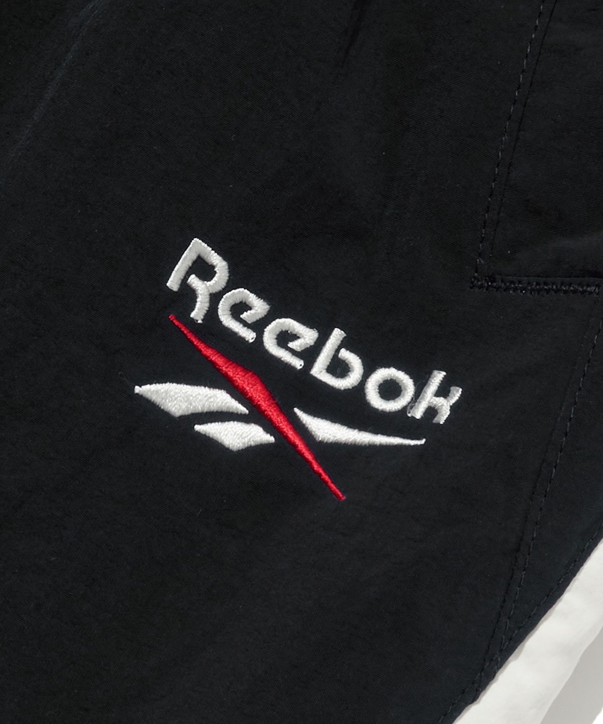 리복(REEBOK) 헤리티지 2WAY 웜업 팬츠 - 블랙