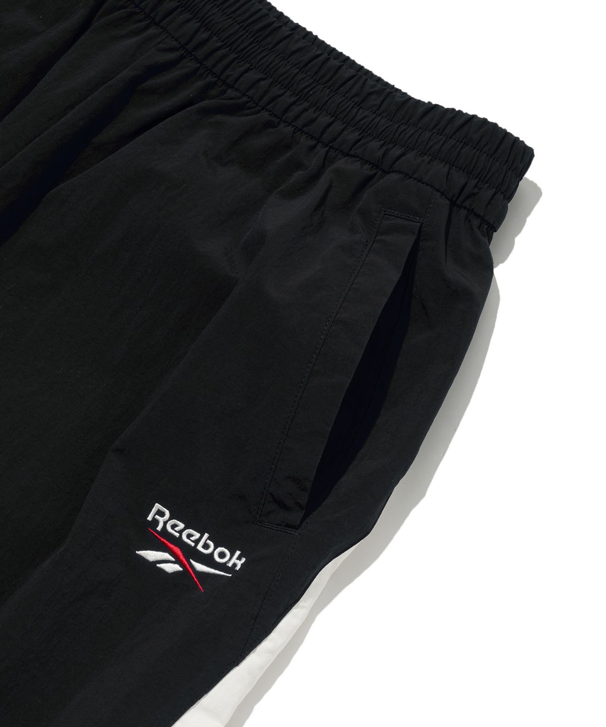 리복(REEBOK) 헤리티지 2WAY 웜업 팬츠 - 블랙