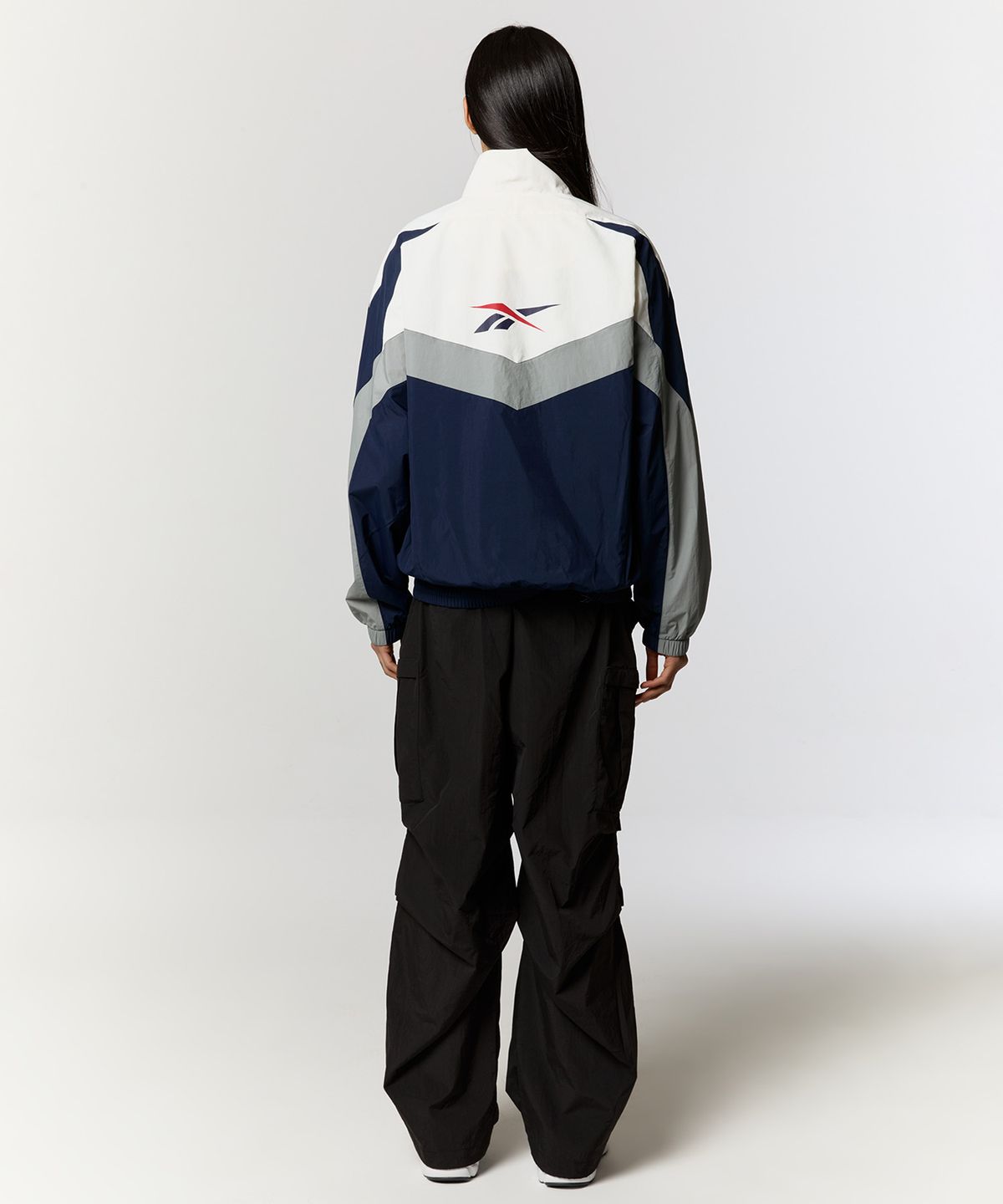 리복(REEBOK) 피스벡터 윈드 브레이커 - 화이트:네이비