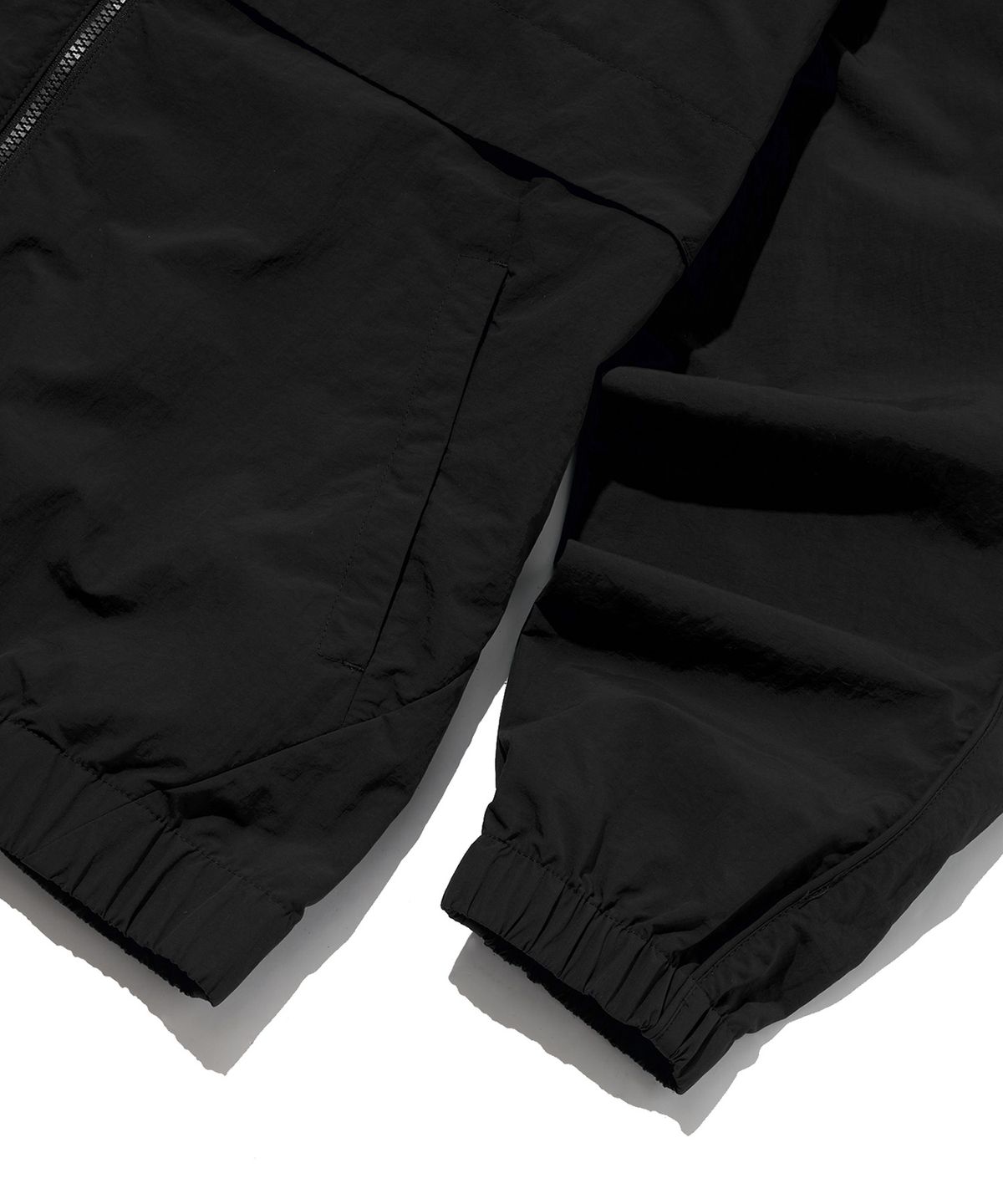 리복(REEBOK) 에센셜 웜업 윈드 브레이커 - 블랙