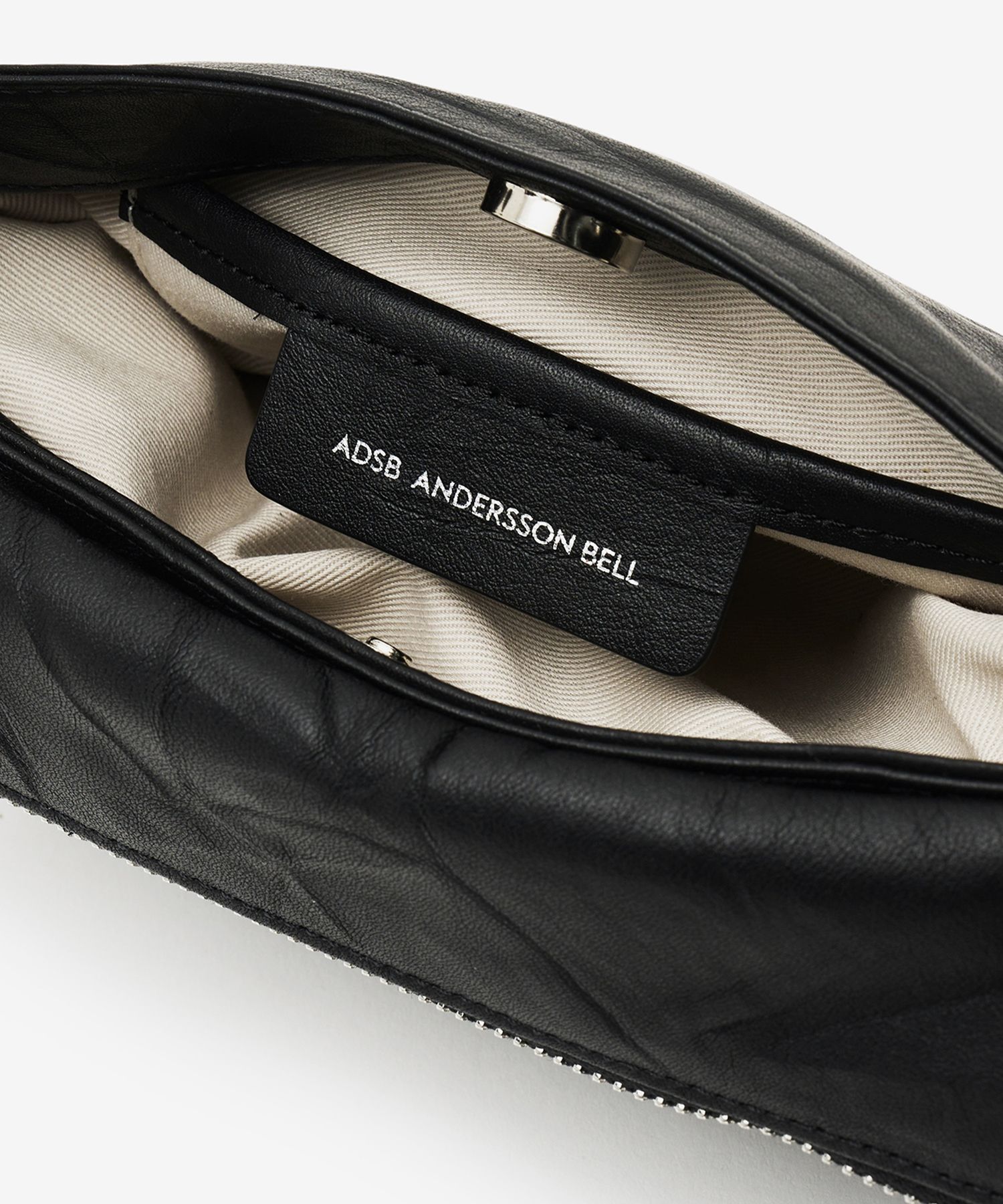MUSINSA | ANDERSSON BELL FOR WOMEN Small Memo Pillow Bag