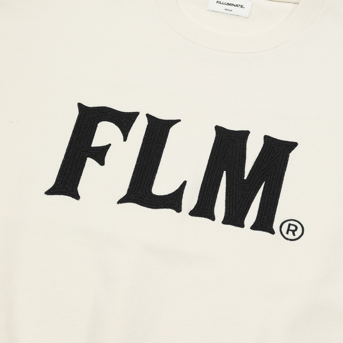 필루미네이트(FILLUMINATE) FLM 스티치 로고 스웨트 셔츠-크림